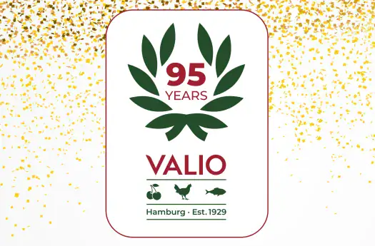 95 Jahre VALIO Logo mit grünen Blättern und Tiermotiven, Jubiläumsdesign, seit 1929 in Hamburg.